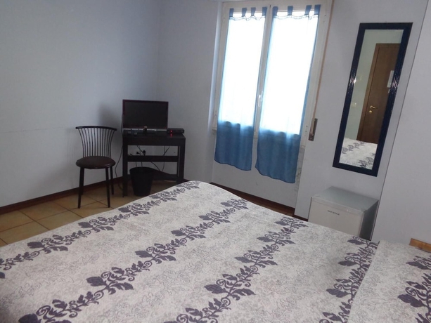 Imagen de la habitación del Apartamentos Bandb Al Grattacielo. Foto 10