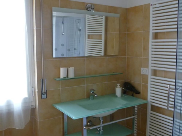Imagen de la habitación del Apartamentos Bandb Al Grattacielo. Foto 16