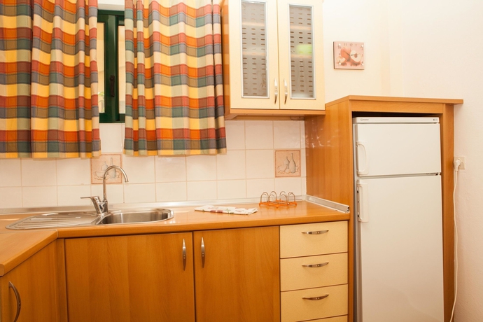 Imagen de la habitación del Apartamentos Barbati Beach Apartments. Foto 14