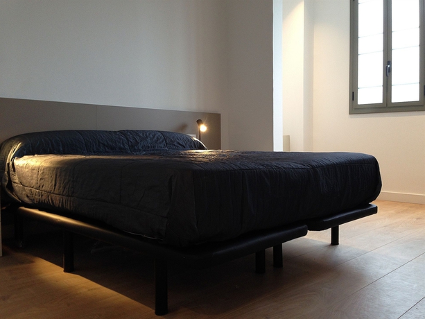 Imagen de la habitación del Apartamentos Barcelona Viladomat. Foto 5