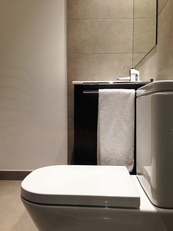 Imagen de la habitación del Apartamentos Barcelona Viladomat. Foto 7