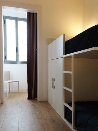 Imagen de la habitación del Apartamentos Barcelona Viladomat. Foto 10