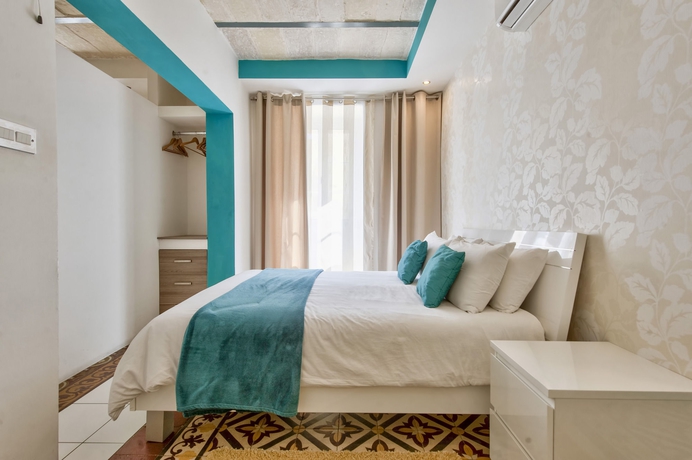 Imagen de la habitación del Apartamentos Barrakka Suites. Foto 11