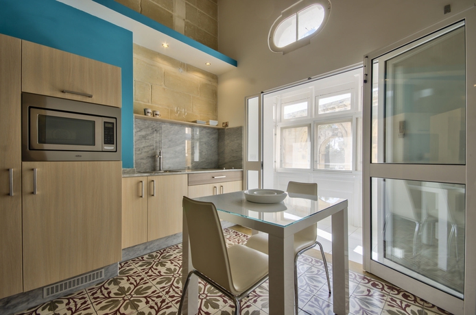 Imagen de la habitación del Apartamentos Barrakka Suites. Foto 13