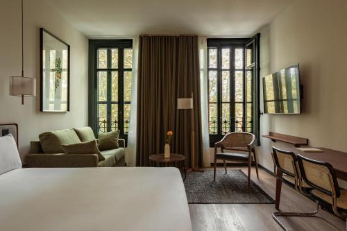 Imagen de la habitación del Apartamentos Batimont Suites. Foto 13