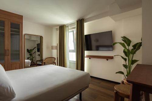 Imagen de la habitación del Apartamentos Batimont Suites. Foto 16