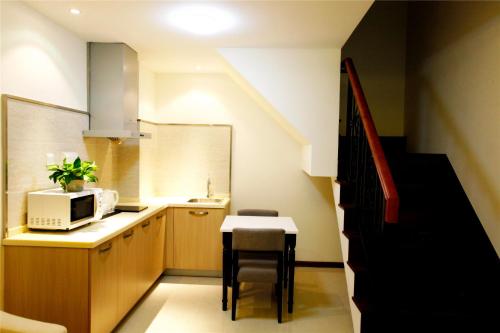 Imagen de la habitación del Apartamentos Bedom Apartments &middot; Gubeikou, Beijing. Foto 9