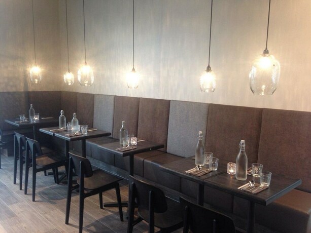 Imagen del bar/restaurante del Apartamentos Bella Apartments and Rooms. Foto 9