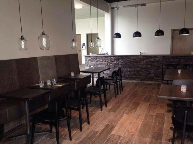 Imagen del bar/restaurante del Apartamentos Bella Apartments and Rooms. Foto 11