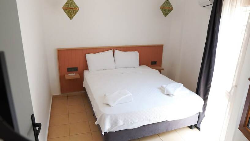 Imagen de la habitación del Apartamentos Bella Kas. Foto 13