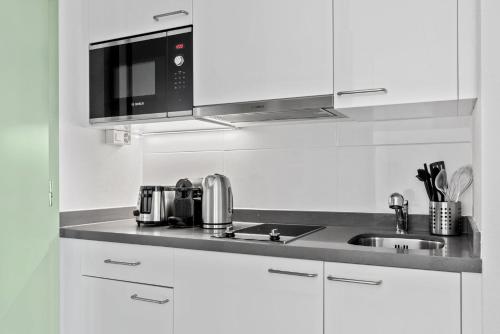 Imagen de la habitación del Apartamentos Berne 2 by Homenhancement - Self Check In. Foto 14