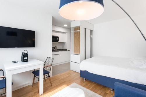 Imagen de la habitación del Apartamentos Berne 2 by Homenhancement - Self Check In. Foto 16