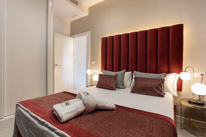 Imagen de la habitación del Apartamentos Bibo Suites Plaza Nueva. Foto 2
