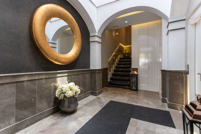 Imagen de los interiores del Apartamentos Bibo Suites Plaza Nueva. Foto 10