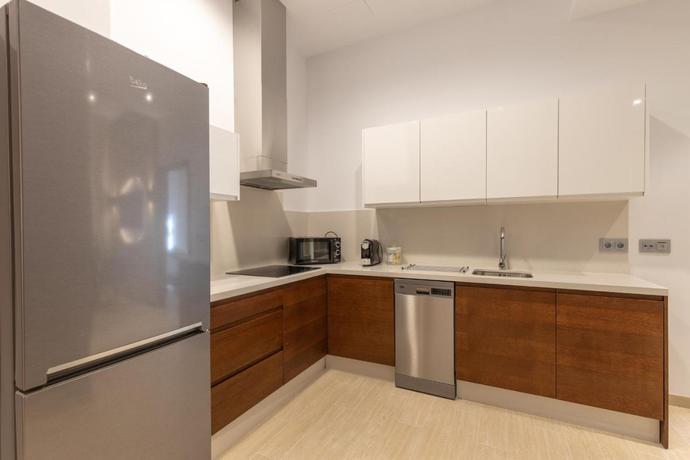 Imagen de la habitación del Apartamentos Bibo Suites San Agustin. Foto 2