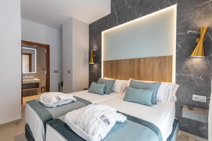 Imagen de la habitación del Apartamentos Bibo Suites San Agustin. Foto 4