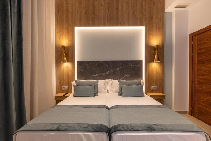 Imagen de la habitación del Apartamentos Bibo Suites San Agustin. Foto 7