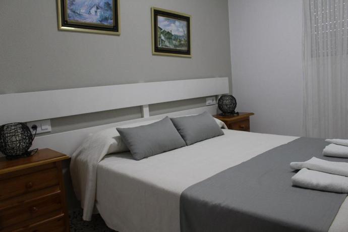 Imagen de la habitación del Apartamentos Bolonia Paraiso. Foto 5