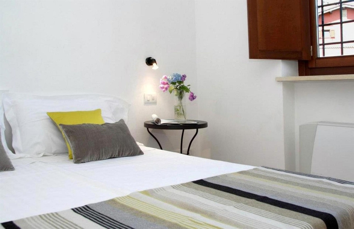 Imagen de la habitación del Apartamentos Borgo Papareschi. Foto 10