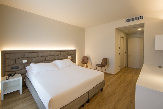 Imagen de la habitación del Apartamentos Borgo San Martino Club Resort. Foto 5