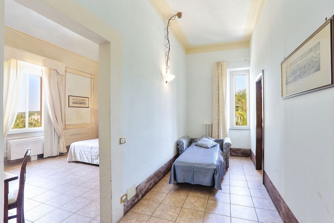 Imagen de la habitación del Apartamentos Borgo San Martino Club Resort. Foto 7