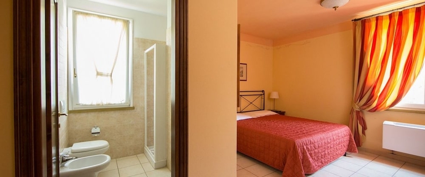 Imagen de la habitación del Apartamentos Borgo San Martino Club Resort. Foto 8