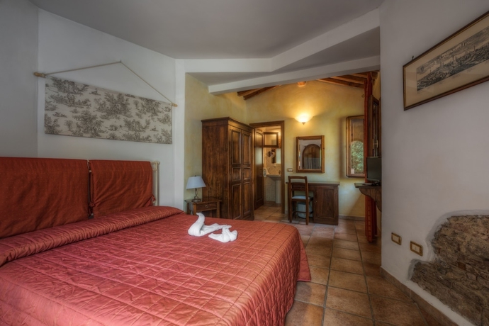 Imagen de la habitación del Apartamentos Borgo San Martino Club Resort. Foto 10