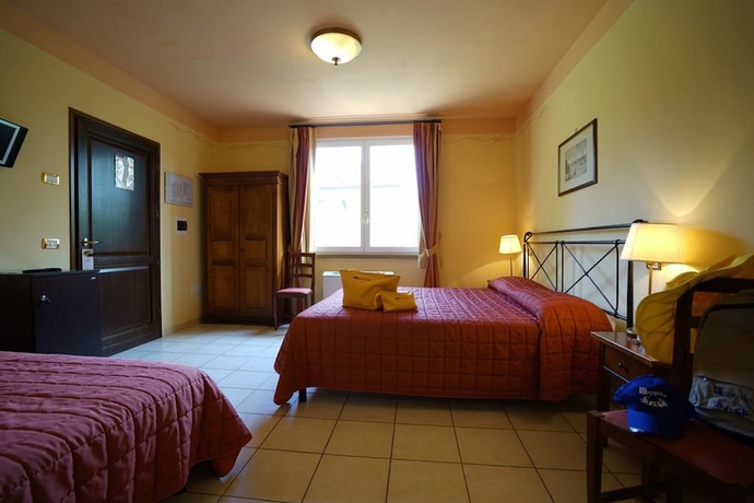 Imagen de la habitación del Apartamentos Borgo San Martino Club Resort. Foto 12