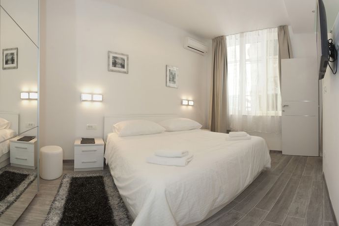 Imagen de la habitación del Apartamentos Bouganvillea Split. Foto 16