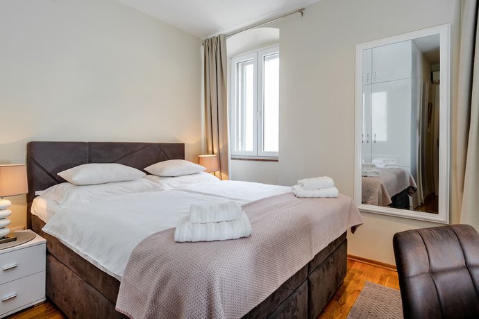 Imagen de la habitación del Apartamentos Bouganvillea Split. Foto 19