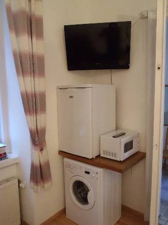 Imagen de la habitación del Apartamentos Brownies Apartments 1200. Foto 45