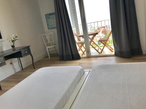 Imagen de la habitación del Apartamentos Bruja. Foto 14