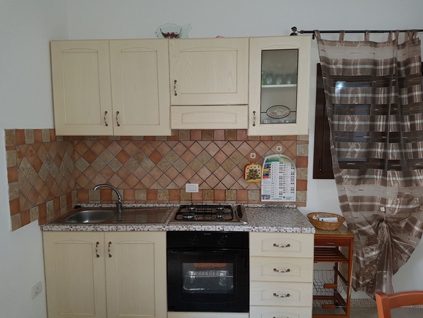 Imagen de la habitación del Apartamentos Budoni San Gavino. Foto 9