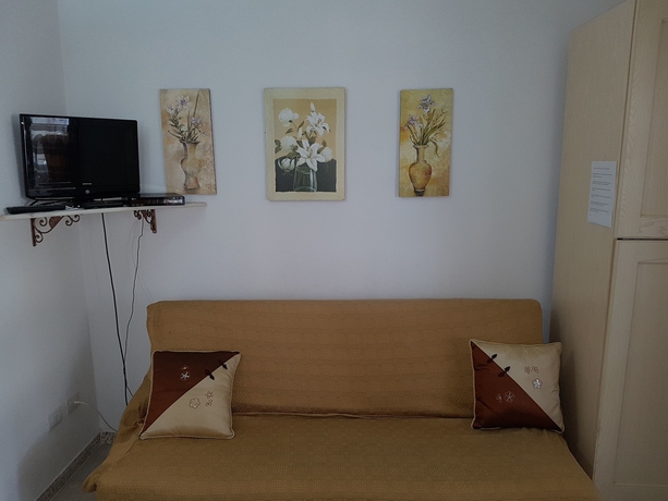 Imagen de los interiores del Apartamentos Budoni San Gavino. Foto 19