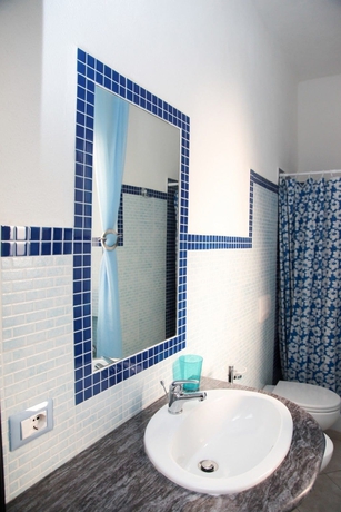 Imagen de la habitación del Apartamentos Budoni San Gavino. Foto 11