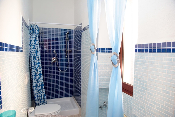 Imagen de la habitación del Apartamentos Budoni San Gavino. Foto 12