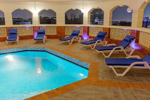 Imagen de la piscina del Apartamentos Building Bin Mahmoud Plaza. Foto 23