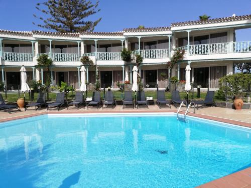Imagen de la piscina del Apartamentos Bull Boutique Casas Carmen. Foto 8