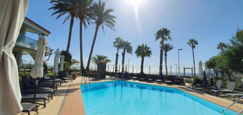 Imagen de la piscina del Apartamentos Bull Boutique Casas Carmen. Foto 9