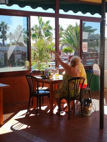 Imagen del bar/restaurante del Apartamentos Bungalows Castillo Club Lake. Foto 5