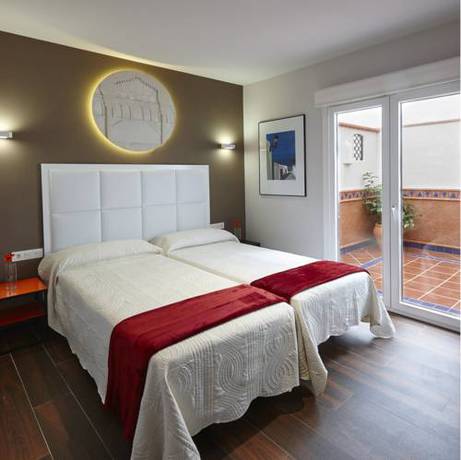 Imagen de la habitación del Apartamentos Caballerizas 3000. Foto 2