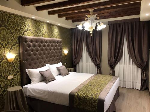 Imagen de la habitación del Apartamentos Cà dell'Arte Palace. Foto 13