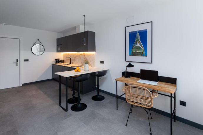 Imagen de la habitación del Apartamentos Calatrava by Alma Suites. Foto 4
