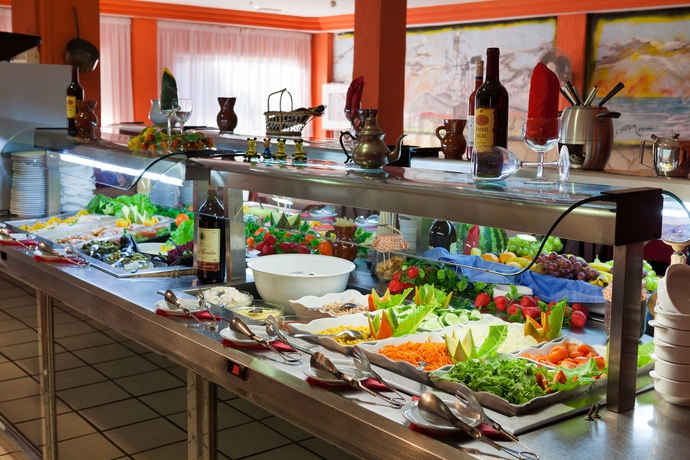 Imagen del bar/restaurante del Apartamentos Caleta Garden. Foto 4