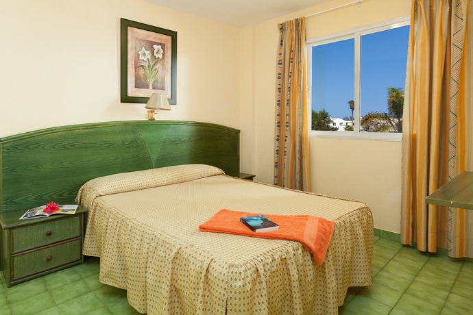 Imagen de la habitación del Apartamentos Caleta Garden. Foto 10