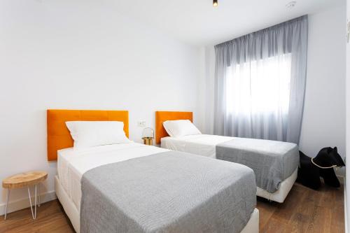 Imagen de la habitación del Apartamentos Caleyro Boutique Apartments - Parking Incluido. Foto 8