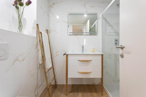 Imagen de la habitación del Apartamentos Caleyro Boutique Apartments - Parking Incluido. Foto 9