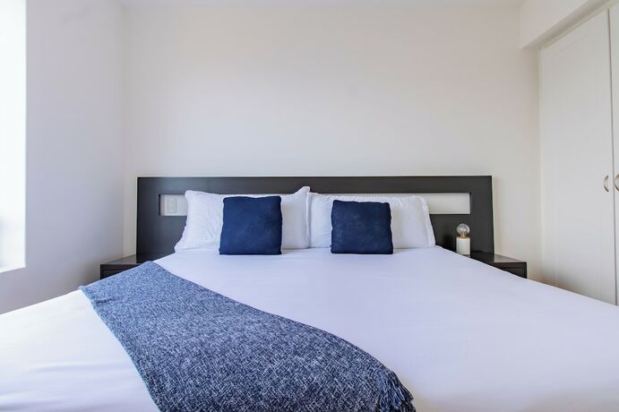 Imagen de la habitación del Apartamentos Capitalia Santa Fe. Foto 16