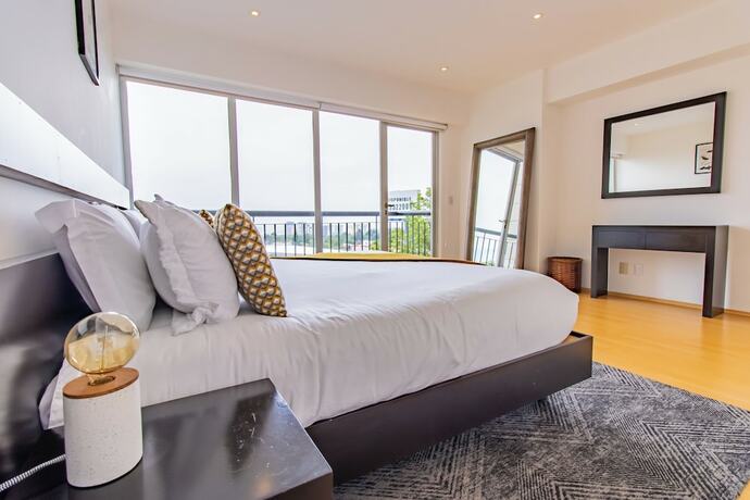 Imagen de la habitación del Apartamentos Capitalia Santa Fe. Foto 17