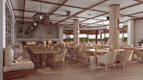 Imagen del bar/restaurante del Apartamentos Caramelo Marina Cala'n Bosch (Adults Only). Foto 3